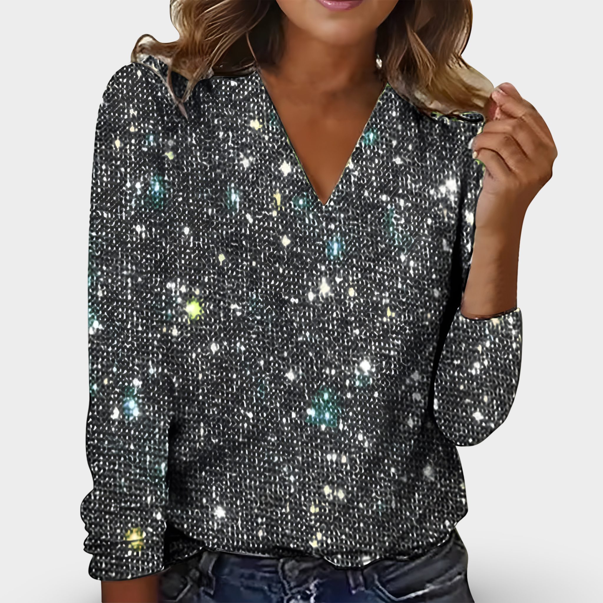Maglia con paillettes e scollo a V