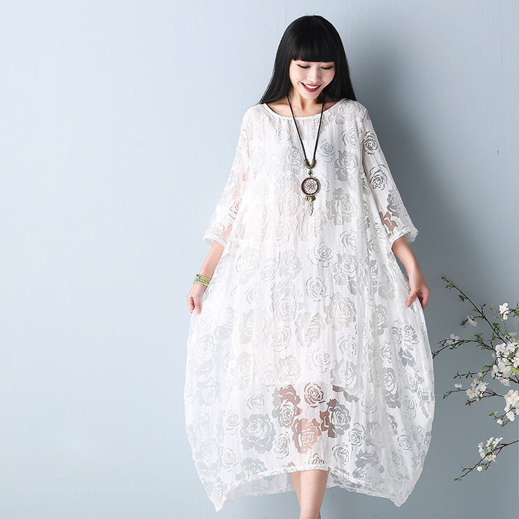 Abito lungo in pizzo trasparente floreale